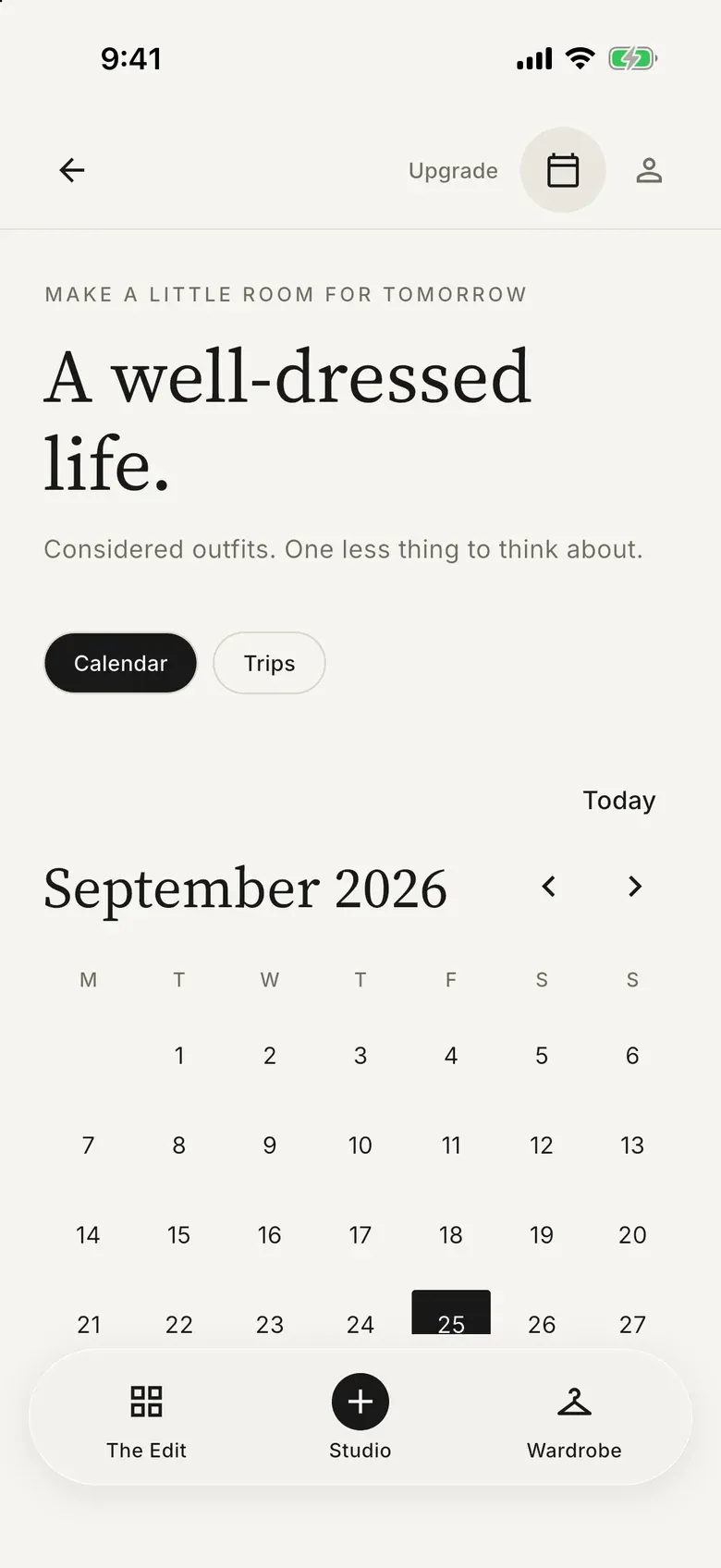 Outfitual planner screen titled “A well-dressed life.” with a September calendar and a trips tab